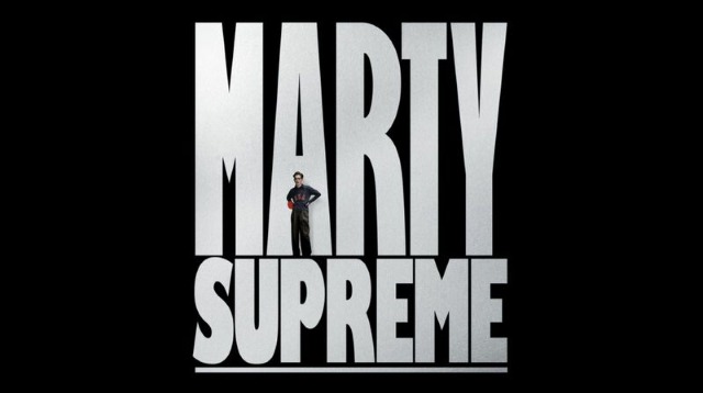 alt="Marty Supreme title in white letters with Timothee Chalamet standing in front of letters"
